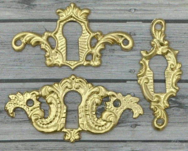 Zestaw metalowych dziurek od klucza 4
